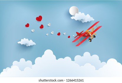 the plane carries the love that is spread. there are love writing banners.
