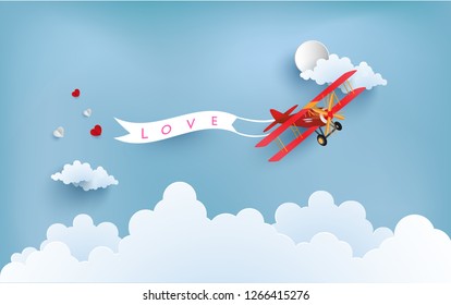 the plane carries the love that is spread. there are love writing banners.