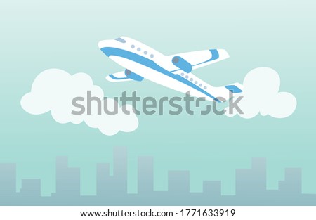 Plane in the clouds over the city. Air travel