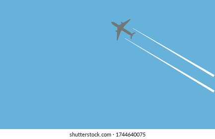 a plane in an empty blue sky