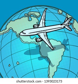 plane flies over globe America. Comic cartoon pop art vector retro vintage drawing