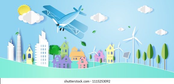 Plane fly over cloud with colorful town, Origami made paper craft,Concept ecology town and blue sky,Paper art idea and digital craft style.