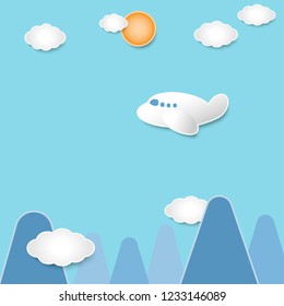 The plane is flying in the bright sky.
