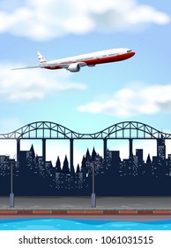 Plane flying over a bridge