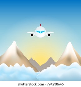 Plane flying over the mountains with sky over the clouds.