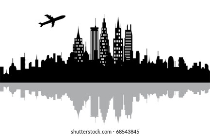 Plane flying over urban city with skyscrapers