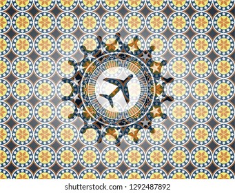 plane icon inside arabesque badge background. arabic decoration.