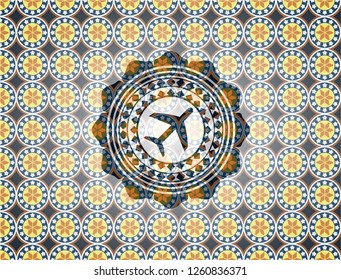 plane icon inside arabesque emblem background. arabic decoration.
