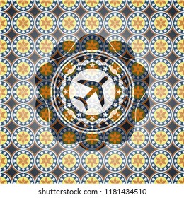 plane icon inside arabic style emblem. Arabesque decoration.