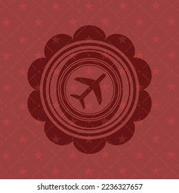 plane icon inside badge with red background. 