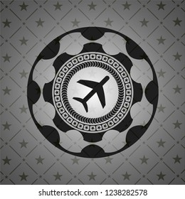 plane icon inside black emblem