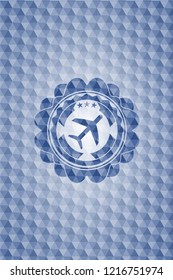 plane icon inside blue emblem with geometric pattern.