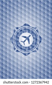plane icon inside blue polygonal badge.