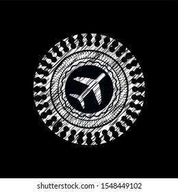 plane icon inside chalk emblem