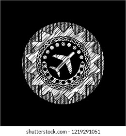 plane icon inside chalkboard emblem