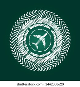 plane icon inside chalkboard emblem