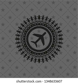 plane icon inside dark emblem