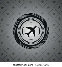 icono del plano dentro del emblema oscuro