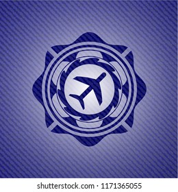plane icon inside denim background