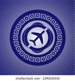 plane icon inside denim background