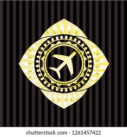 plane icon inside gold emblem or badge