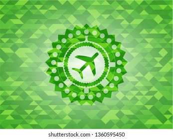 plane icon inside green emblem with mosaic background