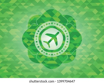 plane icon inside green emblem. Mosaic background