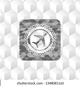 plane icon inside grey badge with geometric cube white background