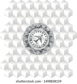 plane icon inside grey badge with geometric cube white background