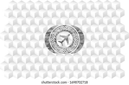 plane icon inside grey badge with geometric cube white background