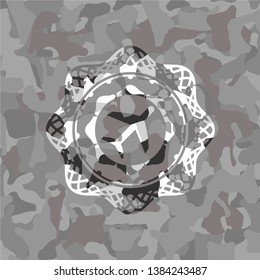 plane icon inside grey camo emblem