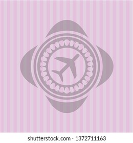 plane icon inside pink emblem. Vintage.