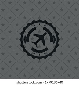 plane icon inside realistic black emblem. 