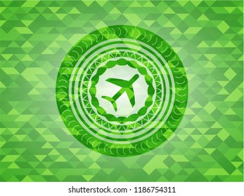 plane icon inside realistic green mosaic emblem
