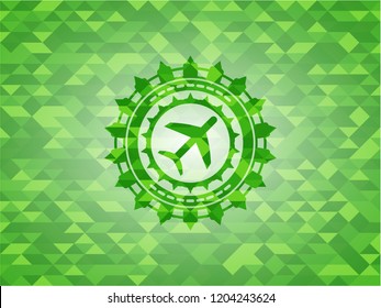 plane icon inside realistic green emblem. Mosaic background