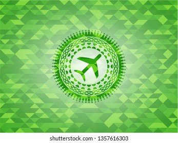 plane icon inside realistic green mosaic emblem