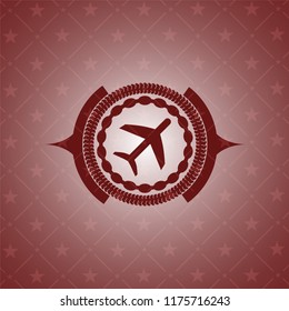 plane icon inside realistic red emblem