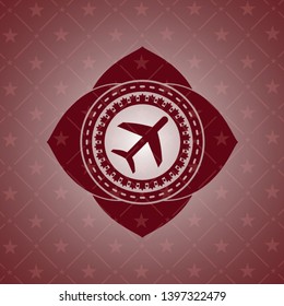 plane icon inside realistic red emblem
