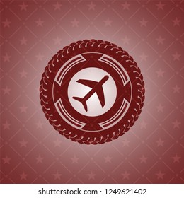 plane icon inside red icon or emblem