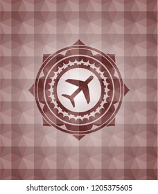 plane icon inside red seamless emblem with geometric pattern background.