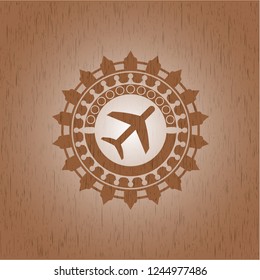 plane icon inside retro style wood emblem