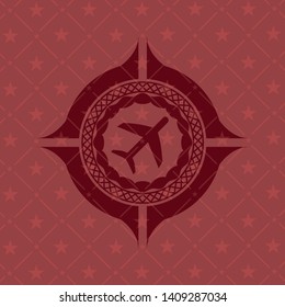 plane icon inside retro style red emblem