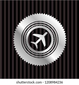 plane icon inside silver badge