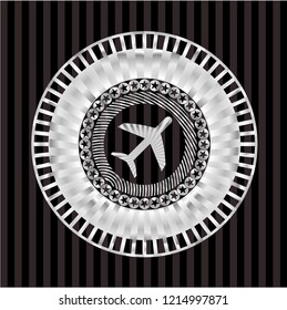 plane icon inside silver badge or emblem