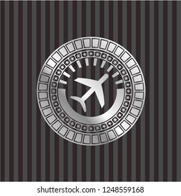 plane icon inside silver badge