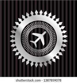 plane icon inside silver badge
