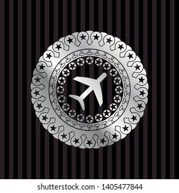 plane icon inside silver badge