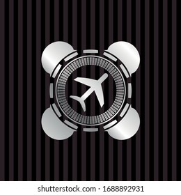 plane icon inside silvery emblem