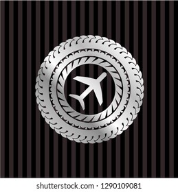 plane icon inside silvery shiny emblem