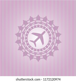 plane icon inside vintage pink emblem
